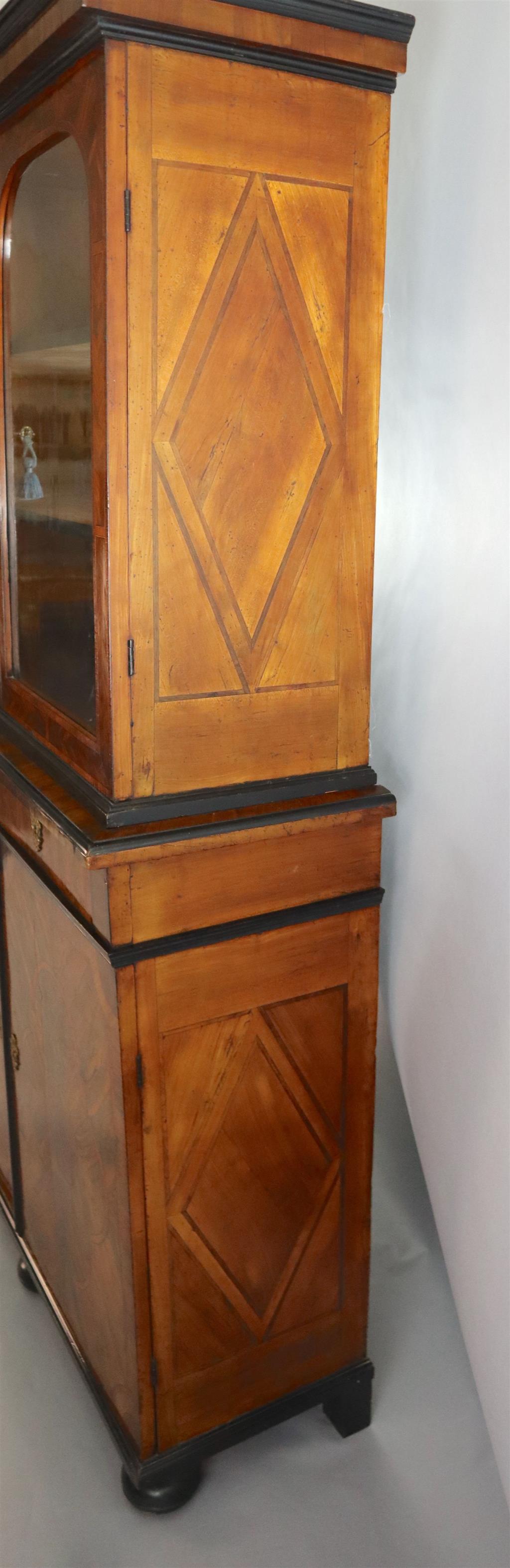 An 18th century Dutch walnut, olivewood and ebony bookcase, W.4ft 2in. D.1ft 5.5in. H.7ft